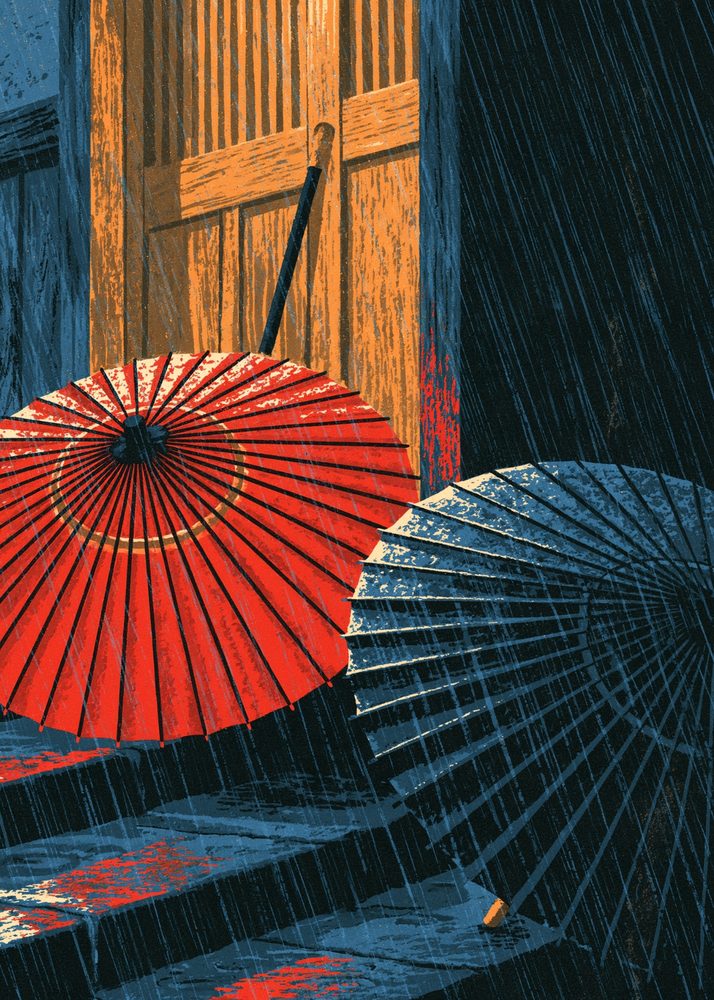 Red and blue paper umbrellas in the rain